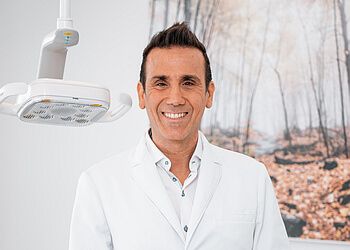 Photo of DR. KARIM EL-SAMRA, CONDITIONS TREATED: Dental Emergency, TMJ and Occlusions TREATMENTS OFFERED: Complete Dental Exam, Invisalign® Aligners, Teeth Whitening, Teeth Cleaning, Restorative Dentistry, Fillings, Veneers, Implants, Crowns, Bridges, Partial and Complete Dentures, Root Canal &amp; Dental Surgery in DOLLARD DES ORMEAUX