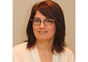 Photo of DR. KESHAVARZ, TREATMENTS OFFERED: Teeth-Whitening, Root Canal, Bridges and Dentures, Dental Bonding, Porcelain Crowns, Veneers, Gum Reshaping, Dental Implants, Tooth Re-Contouring, Invisalign, Dental Fillings, Inlay &amp; Onlay Restorations in BRAMPTON