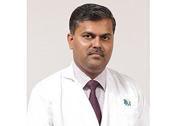 Photo of DR. M. BALAMURUGAN, Nerve and Muscle Disorders, Petrosal Sinus Sampling, CSF Rhinorrhoea Repair Surgery, Head &amp; Neck Tumour Embolization, Brain Aneurysm Treatment, Pediatric Neurosurgery, Carotid Cavernous Fistula Treatment, Carotid Body Tumour Embolization, Foot Drop, Brain Aneurysm Coiling, Spinal Cord, Brain Aneurysm Treatment, Head, Petrosal Sinus Sampling, Spinal, Cerebral Tumor, Spinal Disc Herniation, Slipped Disc, Neck Tumour and Arteriovenous Fistula Embolization, Peripheral Neuro Surgery and Nervous System, Brain Tumours &amp; Disc Prolapse in CHENNAI