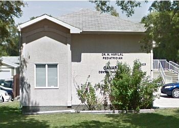 Photo of DR. MAYADEVI HARILAL, CONDITIONS TREATED:Bronchiolitis, Strep Throat, Flu, Tonsillitis, Conjunctivitis, Colds, Allergies, Autism, Diabetes, Learning and Developmental Disabilities, Whooping Cough, ADHD &amp; Chronic Conditions
TREATMENTS OFFERED: Vision and Hearing Screening, Sports Physicals, Immunizations &amp; Well Child Care in LETHBRIDGE