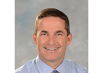 Photo of DR. MICHAEL HUTTER, CONDITIONS TREATED: Periodontal Disease and Tooth Decay TREATMENTS OFFERED: Teeth Whitening, Custom Night Mouthguards, Smile Makeovers, Dental Veneers, Oral Cancer Screening, Complete Oral Exam, Hygiene Services, Fillings, Dentures, Root Canals, Bridges &amp; Crowns in HALTON HILLS