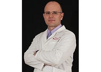Photo of DR. MICHAEL MESIC, CONDITIONS TREATED:Fungal, Warts, Plantar Fasciitis, Callouses, Ingrown Toenails, Hallux Limitus, Flat Feet, Heel Pain, Corns, Diabetes, Bunions, Burning Feet, Metatarsalgia, Morton’s Neuroma, Hammertoes, Blisters, PT Tendonitis-Acquired Flat Foot, Achilles Tendonitis, Neuropathy, Athlete’s Foot and Sesamoiditis
TREATMENTS OFFERED: Laser Toenail Fungus &amp; Wart Treatment in ST. CATHARINES
