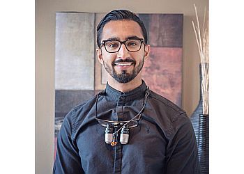 Photo of DR. NAVI BOPARAI, CONDITIONS TREATED: Gum Disease and TMD/TMJ Disorders TREATMENTS OFFERED: Root Canal, Crown Therapy, Invisalign, Teeth Whitening, Porcelain Veneers, Dentures, Mouth Guards, Tooth Extractions, Cosmetic Dentistry, Check-ups and Cleanings, Children’s Dentistry, Dental Bonding, Crowns, Bridges, Implants, Smile Makeovers, Preventative &amp; Cosmetic Treatments in DELTA