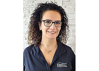 Photo of DR. PATRICIA KHAMIS-SILVA, CONDITIONS TREATED:Sleep Apnea, Migraine Pain and Bad BreathTREATMENTS OFFERED:Invisalign, Extractions, Bridges, Dentures, Full Mouth Restoration, Teeth Whitening, Therapeutic Botox, Sports Guards, Root Canal, Implants, Orthodontics, Cosmetic Dentistry, Onlays, Hygiene, Veneers, Bonded Fillings, Inlays &amp; Crowns in AJAX