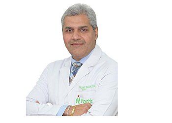 Photo of DR. RAJAT BHATIA, Cysts, Sebaceous Cyst Excision, Ear Reconstruction, Nasal and Sinus Allergy Care, Otoplasty, Hearing Deficiency Assessment, Surgery of The Facial Nerve, Surgery for Snoring, Head and Neck Tumor / Cancer Surgery, Laser Surgeries for Head and Neck Lesions, Ear Wax (Cerumen) Removal, Nasal Disorders, Nasal Endoscopy, Throat and Voice Problems &amp; Fracture Nasal Bone Correction in LUDHIANA