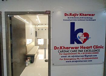 Photo of DR. RAJIV KHARWAR, Coronary Angiography and Angioplasty with Stenting, Cardiac Arrest, Balloon Mitral/Aortic/Pulmonary Valvuloplasty, Permanent Pacemaker and AICD, Device Closure in Congenital Heart Diseases, Carotid and Renal Angioplasty, Treadmill Stress Test &amp; Holter Monitoring in SURAT