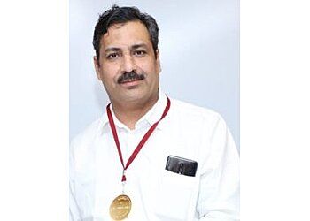 Photo of DR. SATISH JAIN, Balloon Sinuplasty, Ear Infection, Ear Pain, Ear Wax Removal, Foreign Body Ears Examination and Treatment, Foreign Body Throat Examination, Head and Neck Infection, Head and Neck Tumor, Hearing Speech Impairment, Laryngoscopy Surgery, Mouth Bleed, Nasal Allergy, Nasal Septum Deviation, Neck Infection, Nose Disease, Paediatric ENT Doctors, Speaking Difficulty &amp; Tonsillitis Treatment in JAIPUR