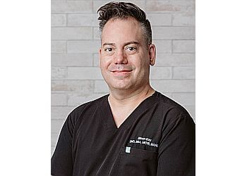 Photo of DR. SIMON ROY, CONDITIONS TREATED: Temporomandibular Joint TREATMENTS OFFERED:Cosmetic Dentistry, Intraoral Camera, CEREC Crowns, Damon Braces, Cavities, Dental Implants, Digital Radiography, Endodontics, Veneers, Fixed Bridges, Full Rehabilitation, Gingival Graft, Invisalign, Orthodontics, Partial Prosthesis, Periodontology, Prosthetics on Implants, Space Keeper &amp; Wisdom Teeth in SHERBROOKE