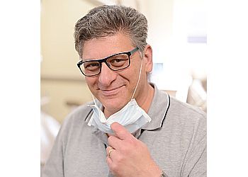Photo of DR. STEVEN DESKIN, TREATMENTS OFFERED:General and Cosmetic Dentistry, Teeth Whitening, Veneers, Dentures, Braces, Orthodontics, Oral Surgery, Root Canal, Gum Treatment, Bonding, Crowns, Bridges, Inlays, Onlays, Implants, White Fillings, Cleanings &amp; Emergency Dental Care in BRANTFORD