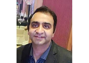 Photo of DR. TANUJ BHATIA, Angiography, Angioplasty, Angioplasty with Stent Placement, Hypertension, Cardiac Catheterisation, Cardiac Imaging, Defibrillator Implantation, Treadmill Test, Device Implantation and Extraction, Heart Failure Management, Chest Pain, Implantable Cardioverter-Defibrillator (ICD) Placement &amp; Interventional Catheterisation in DEHRADUN