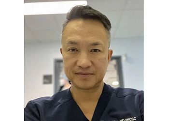 Photo of DR. THIEN VU MAC, CONDITIONS TREATED: Sports-Related Injuries, Hand Conditions, Broken Hand, Wrist Pain, Elbow Injury, Trauma &amp; Fractures TREATMENTS OFFERED: Total and Partial Shoulder &amp; Knee Replacements in BROSSARD