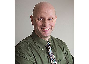 Photo of DR. TIM ROLLINGSON, CONDITIONS TREATED: Sleep Apnea and Dental Emergency Services TREATMENTS OFFERED: General Dentistry, Cosmetic Services, Dental Implants, Braces, Oral Surgery, Root Canal Therapy, Children&#x27;s Services, Botox® Treatment &amp; Sedation Services in LETHBRIDGE