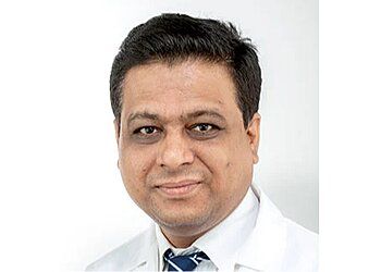 Photo of DR. VIJAY GAJANAN SURASE, Cardiac Arrhythmia and Catheterization, Heart Disease, Abdominal Aortic Aneurysm, Atherosclerosis, Cardiomyopathy, Heart Blockage and Conditions, Angina Pectoris, Peripheral and Coronary Artery Disease, Myocardial Infarction &amp; Hypertension in THANE
