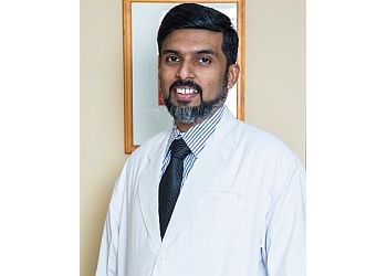 Photo of DR. VIKRAM KUMAR, Chemical Peel Treatment for Sun-damaged Skin, Dermal Filler-Wrinkle Removal Treatment, Permanent Laser Hair Removal Treatment, Laser Resurfacing Treatment for Acne Scar Removal, Fat Grafting, Ear Lobe Repair, Laser Hair Removal, Male Breast Correction, Breast Reduction and Augmentation, Liposuction, Dimple Plasty, Abdominoplasty, Labiaplasty, Laser Resurfacing, Dermal Filler, Rhinoplasty, Otoplasty, Face Fat Transfer Treatment, Earlobe Repair Surgery Treatment, Coolsculpting, Micro-Dermabrasion, Tattoo &amp; Mole Removal in COIMBATORE