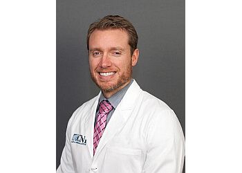 Photo of ELLIOTT FOSTER, CONDITIONS TREATED:Back Pain, Neck Pain, Neuromuscular Diseases/Weakness, Peripheral Nerve Damage/ Numbness/ Pain, Multiple Sclerosis and Other Autoimmune Diseases, Epilepsy (Seizures), Dementia, Movement Disorders Such As Parkinson’s Disease/ Tremor, Sleep Disorders, Headaches/Migraines, Stroke/ Ministroke (Tia), Head Trauma/Concussion, Infections of The Nervous System, Tumors of The Nervous System, Gait Disorders, Headaches, Tremor or Abnormal Movements, Vision Changes, Loss of Consciousness or Passing Out, Insomnia or Sleep Disorders, Restless Legs, Dizziness &amp; Numbness or Tingling in MOBILE