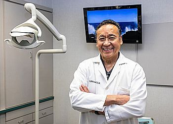 Photo of EMILE MCLAURIAN, CONDITIONS TREATED:Gum DiseaseTREATMENTS OFFERED:Dentures, Crowns and Veneers, Root Canal, Teeth Whitening, Emergency Dentistry, Fillings, Extraction, Invisalign, Sedation &amp; Implant Restoration in KANSAS CITY