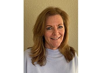 Photo of ERIN SANTILLI, CONDITIONS TREATED:Arthritis, Post-Surgical Rehab, Neck Pain, Back Pain, Shoulder Pain, Elbow Pain, Knee Injuries, Foot and Ankle Injuries, Tendon and Ligament Injuries, Muscle Weakness, Overuse Injuries, Pediatric Injuries and Therapy, Geriatric Injuries and Conditions, Carpal Tunnel Syndrome, Rotator Cuff Tear, TMJ (Temporomandibular Joint) Disorders &amp; Incontinence in CENTENNIAL