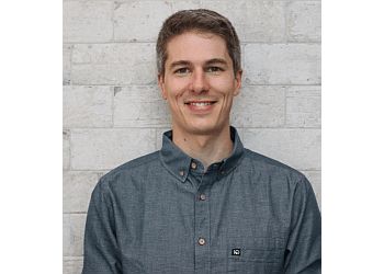 Photo of EVAN THOMAS, CONDITIONS TREATED:
Sports Injuries, Sprains and Strains, Nerve Pain, Chronic Pain, Car Accidents, Workplace Injuries, Neck and Shoulder Pain, Low Back Pain, Hip and Knee Pain, Disc Injuries, Tendinitis, Ligament Sprains, Rotator Cuff Strains and Tears, Tennis and Golfer’s Elbow, Meniscus Injuries, Arthritis, Ankle Sprains, Post-Surgery, Vulvodynia, Persistent Prostatitis &amp; Pelvic Organ Prolapse
TREATMENTS OFFERED:
Physiotherapy, Exercise Therapy, Pelvic Floor Therapy, Pre-Post-Natal Care, Bike Fitting, Fitness Program Design, Active Rehab, IMS, Dry Needling, Concussion Rehab, Vestibular Therapy, Telehealth, Massage/Soft Tissue Release, Stretching, Traction &amp; Nutritional Counselling in VICTORIA