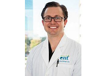 Photo of J. BRADLEY MCINTYRE, CONDITIONS TREATED: Ear Tubes for Infections, Hearing Aids, Minimally Invasive Balloon Sinuplasty, Surgical Management of Sleep Apnea, Thyroid and Endoscopic Sinus Surgeries, Voice Disorders, Throat Problems, Nasal Obstruction, Snoring, Sleep Disordered Breathing &amp; Hoarseness, TREATMENTS OFFERED: Ear Tubes – BMT (Bilateral Myringotomy and Tubes) – Middle Ear Infections, Tonsillectomy and Adenoidectomy (T&amp;A), Septoplasty – Deviated Septum Surgery for Nasal Obstruction, Sinus Surgery – Endoscopic Sinus Surgery, Inferior Turbinate Reduction – Nasal Obstruction, Thyroidectomy – Minimally Invasive Thyroid Surgery, Parathyroidectomy – Minimally Invasive Surgery, Office Tympanostomy Tube Placement – Middle Ear Infections &amp; Closed Nasal Reduction in FORT WORTH