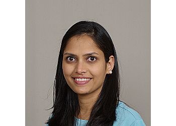 Photo of JAINISHA PATEL, CONDITIONS TREATED: Gingivitis And Gum Disease, Oral Cancer, Oral Pathology
TREATMENTS OFFERED: Full Mouth Reconstruction, Dental Veneers, Dental Crowns, Dental Bridges, Dentures, Dental Fillings, Onlays, Root Canals, Dental Hygiene, Dental Exams, Sealants, Dental X-rays, Mouth Guards For Sports, Night Mouth Guards, Dental Bone Grafts, Sedation, Tooth Extractions &amp; Teeth Whitening in CARROLLTON