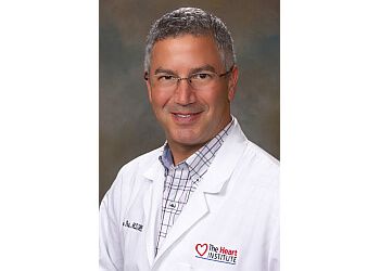 Photo of JAMES R POST, Aortic Aneurysm, Congenital Heart Defects, Heart Attack, Emergency Cardioversion, Palpitations, Unstable Angina, Cardiac Catheterization and Ultrasound, Cardiomyopathy, Cardiovascular Arrhythmia, Cardiac Electrophysiology, Heart Valve Disease, Carotid Artery Stenosis, Cardiac Arrest and Abnormal Heart Arrhythmia, High Blood Pressure, Cardiac Stress Test, Arrhythmias, Coronary Artery Disease (CAD), Pacemaker Implantation &amp; Tachycardia in ST PETERSBURG