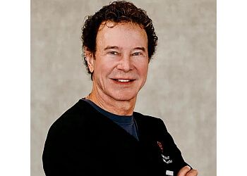 Photo of JOE GRYSKIEWICZ, Breast Augmentation with Lift, Breast Reduction and Reconstruction, Male Breast Reduction (Gynecomastia), Liposuction, Tummy Tuck (Abdominoplasty), Mommy Makeover, CoolSculpting, Arm and Thigh Lift, Labiaplasty, Brow and Facelift, Eyelid Surgery, Chin Implants, Facial Liposuction &amp; Buccal Fat Removal in MINNEAPOLIS