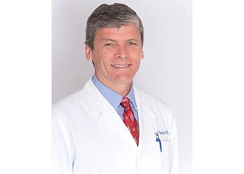 Photo of JOEL B. RAGLAND, TREATMENTS OFFERED:Spinal Decompression Surgery, Fusion and Stenosis, Brain and Nervous System, Meninges, Skull, Pituitary Gland, Vertebral Column, Cranial Nerves, Scoliosis &amp; Herniated Discs in KNOXVILLE