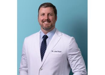 Photo of JOEL HURT, TREATMENTS OFFERED: Robotic Total Knee Replacement (Primary and Revision), Robotic Partial Knee Replacement, ACL Reconstruction, Arthroscopy, Meniscal Repair, Complex Ligament Reconstruction/repair, Cartilage Transplant Surgery, Rotator Cuff Repair, Instability Surgery &amp; Computer-Guided Shoulder Replacement in AUSTIN