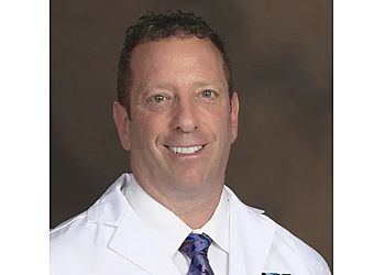 Photo of JOEL S. SEGALMAN, CONDITIONS TREATED:Achilles Tendon Repair, Amniotic Injections, Ankle Fractures, Athlete&#x27;s Foot, Blisters, Bunions, Calluses, Club Foot, Corns, Diabetes, Fall Prevention, Flat Foot Foot Deformities, Heel, Ankle and Foot Pain and Ulcers, Gout, Hammertoes, Plantar Warts, Toenail Disorder &amp; Tendon Injuries in WATERBURY