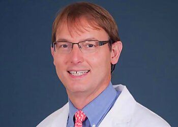 Photo of JOHN C. BRITT, CONDITIONS TREATED:
Ear: Dizziness and Vertigo, A Tingling Sensation in The Face, Changes in Taste, Headaches and Confusion, Loss of Balance, Trouble Sleeping, Hearing Loss, Chronic Infections, Meningitis, Ear Trauma, Earwax Buildup &amp; Tinnitus 
Nose: Thyroid Problems, Sinusitis, Loss of Smell, Chronic Cough, Crooked Nose, Bloody Nose &amp; Nosebleeds 
Throat: Regurgitation, Indigestion, Difficulty Swallowing, Hoarseness, Laryngitis, Tonsillitis &amp; Sore Throat in WINSTON SALEM