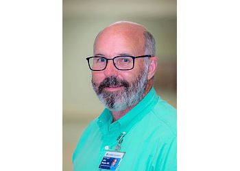 Photo of JOHN CHRISTOPHER MORGAN, CONDITIONS TREATED:
Inflammation, Pain, Autonomic Disorders, Movement Disorders, Chronic Inflammatory Demyelinating Polyneuritis, Aneurysm, Neuromuscular Diseases, Concussion, Headaches, General Neurology, Cerebral Artery Thrombosis, Cluster Headache, Epilepsy, Diplopia, Migraine, Toxic Neuropathy, Thrombosis, and Restless Leg Syndrome
TREATMENTS OFFERED:
Electroencephalography, Spinal Tap, Brain Biopsy, Evoked Potentials Tests, Electrodiagnostic Tests, Cerebral Angiography &amp; MRI-Guided Laser Ablation in AUGUSTA