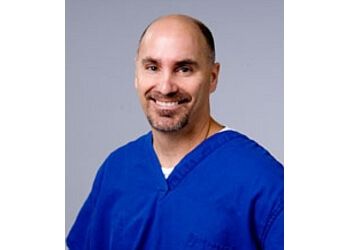 Photo of JOHN S. MAROUK, CONDITIONS TREATED:Adult Cranial and Spinal Trauma, Adult Hydrocephalus, Cranial Neuropathies, Cranial/Spinal Tumors, Degenerative/Congenital Spinal Disorders, and Vertebral Compression Fractures
TREATMENTS OFFERED:
Functional Neurosurgery &amp; Peripheral Nerve Surgery in TULSA