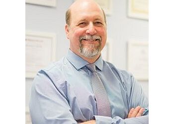 Photo of JOHN VAN DER KARR, CONDITIONS TREATED:Ankle Pain, Hip, Wrist, Arthritis, Posture Correction, Elbow, Custom Hand Splinting, Foot, Knee, Carpal Tunnel Syndrome, Neurological and Balance Disorders, Post Surgical Pt, Ergonomics, Tmj Disorder, Athletic Injuries, Headache, Groin Strain, Shoulder, Women&#x27;s Health, Torticollis, Flat Head Syndrome / Plagiocephaly, Cerebral Palsy, Lip Tie / Tongue Tie, Spina Bifida (Split Spine), Genetic Syndromes, Brachial Plexus Injuries, Hypotonia (Low Muscle Tone), Hypertonia (High Muscle Tone), Balance Disorder, Gross Motor Delay, Developmental Delay, Developmental Coordination Disorder, Toe Walking, Down Syndrome, Prematurity, Autism Spectrum Disorder, Clubfoot, Gait Abnormalities &amp; Sports Injuries in JERSEY CITY