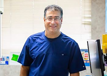 Photo of JOSEPH RAJABI, CONDITIONS TREATED: Dental Exams, X-Rays, Cleanings, Root Canal Therapy, Tooth Extractions and Sedation TREATMENTS OFFERED: Porcelain Crowns, Teeth Whitening, Bridges, Veneers, Bonding, Inlays, Onlays, Composite Fillings, Amalgam Fillings, Implants, Orthodontics, Braces, Invisalign, Dentures &amp; Teeth Straightening in CORONA