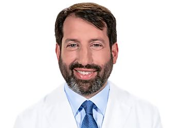 Photo of JOSHUA FOXSON, CONDITIONS TREATED: 
Facial Trauma, Impacted Canines and Teeth and Wisdom Teeth Removal 

TREATMENTS OFFERED:
All-On-4, Bone Grafting, General Tooth Extraction, Sinus Lift Graft, Orthognathic Surgery, Dental Implants, Anesthesia, Sedation Dentistry, Canine Exposure &amp; Corrective Jaw Surgery in NAPERVILLE