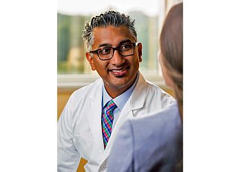 Photo of KAMAL R. WOODS, CONDITIONS TREATED:Pinched Nerve, Sciatica and Spinal Stenosis TREATMENTS OFFERED: Minimally Invasive Spinal, Disc Replacement, Spine Surgery, Back &amp; Robotic Surgery in DAYTON