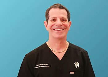 Photo of KEITH L. SCHWARTZ DMD, TREATMENTS OFFERED:Invisalign® Treatment, Bonding, Ceramic Crowns, Cosmetic Fillings, Smile Makeover, Inlays and Onlays, Veneers, Whitening &amp; Black Triangle in CORAL SPRINGS
