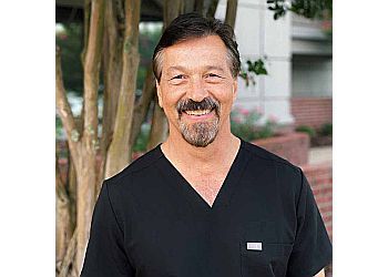 Photo of KILLIAN HORNER, CONDITIONS TREATED: Periodontal Disease, TMJ, Snoring, Sleep Apnea and Oral Cancer
TREATMENTS OFFERED: Implants, Orthodontics, Oral Hygiene, Oral Surgery, Cosmetic Dentistry, Restorative Dentistry, Root Canal, Sedation, TMJ Therapy, Oral Cancer Screening, Teeth Whitening, Amalgam Fillings, Composite Fillings, Bonding, Invisalign, Root Planing, Scaling, Botox &amp; Juvederm in MONTGOMERY