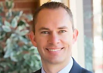 Photo of KYLE RICKS, CONDITIONS TREATED: TMJ, Periodontal Disease and Occlusal TREATMENTS OFFERED: Laser/Perio, Cosmetic and Family Dentistry, Teeth Whitening, Implants, Dentures, Same Day Crowns, Invisalign, Emergency Dental Care, Smile Design &amp; Root Canals in AURORA