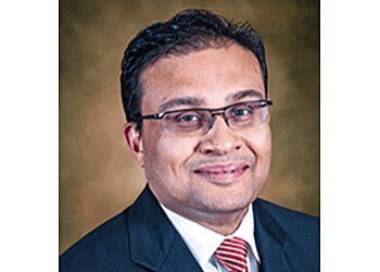 Photo of MANESH THOMAS, Chest Pain Evaluation, Heart Attack, Failure, Unstable Angina, Cardiac Catheterization, Resynchronization Therapy (CRT), Intravascular Ultrasound, Consultative, Preventative Cardiology, Enhanced External Counterpulsation (EECP), Coronary Angioplasty, Stents, Stress Echocardiography, Peripheral Angiography, Arrhythmia Management, Pacemaker Implantation &amp; Varicose Veins in FAYETTEVILLE