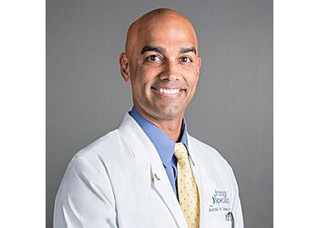 Photo of MANISH N. DAMANI, CONDITIONS TREATED:Erectile Dysfunction, Low Testosterone, Kidney Cancer, Prostate and Testicular Cancer Treatment, Kidney Stones, Blood in Urine, Enlarged Prostate, Prostatitis, Neurogenic Bladder, Male and Female Urinary Incontinence, Prostatitis Infection, Pelvic Organ Prolapse and Overactive TREATMENTS OFFERED:Male infertility/Vasectomy Reversals, Microsurgery, Reproductive, Xiaflex Injections, Da Vinci® Robotic Prostatectomy, Cryotherapy, Open Radical Prostatectomy, Brachytherapy &amp; High-Intensity Focused Ultrasound in CHARLOTTE