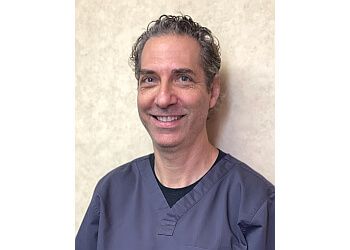 Photo of MARC WERTHEIM, CONDITIONS TREATED: General, Sedation and Cosmetic Dentistry, Invisalign, Maxillofacial Surgery, Bad Breath, Night/Sports Mouth Guards, Hygiene, Porcelain Veneers, Dentures, Toothaches, Full Mouth Dental Reconstruction, Extractions, Oral Cancer Screening, Root Canal Therapy, Sealants, Bonding, Braces &amp; Fillings in NEWARK