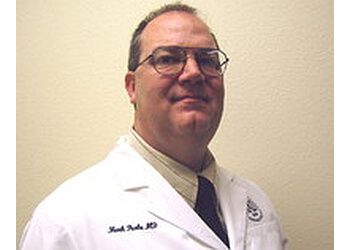 Photo of MARK F. PEAKE, CONDITIONS TREATED:
Acne, Cysts, Basal Cell Carcinoma, Sun Damage, Warts, Mohs Micrographic Surgery, Alopecia Areata, Fungal Infection, Actinic-Keratosis, Calluses and Corns, Cellulitis, Impetigo, Psoriasis, Wrinkle &amp; EczemaTREATMENTS OFFERED:Photodynamic Therapy (PDT) &amp; Narrow Band Ultraviolet Light Therapy in EL PASO