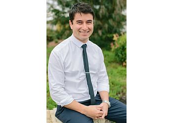 Photo of MARK IRELAND, 3D Gait Analysis, Walking and Running Assessment, General Footcare, Orthotics Heel Pain, Plantar Warts, Fungal Nail Infections, Musculoskeletal Laser, Post-Operative Rehab, Wart Removal, Post Operative Rehabilitation, Knee Pain, Children&#x27;s Foot, General Footcare, Walking and Running Problems, Ingrown and Fungal Toenails, Radial Shockwave Therapy, Warts, Growing Pains, Forefoot Pain, Flat Feet, Knee and Heel Pain, Pigeon Toed Walking, Achilles Tendinopathy, Leg Problems, Diabetic Footcare, Patellofemoral Syndrome, Sever’s Lesion &amp; Tenoperiostitis of the Shin Treatments in ALBANY