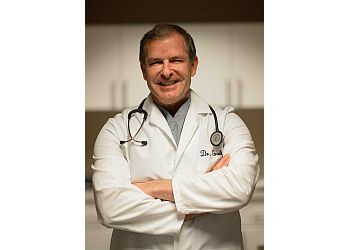 Photo of MARK R. GRUBB, CONDITIONS TREATED: Chronic Neck Pain, Low Back Pain, Lumbar Spine Fracture, Cervical Spine Myelopathy, Scoliosis, Spondylolisthesis, Osteoarthritis of the Spine, Radiculopathy, Spine Deformities, Arthritis, Thoracic Spine Fracture &amp; Spine Disorders
TREATMENTS OFFERED: Chiropractic Care, Minimally Invasive Spinal Surgery, Correction Surgery, Discectomies &amp; Fracture Care in AKRON