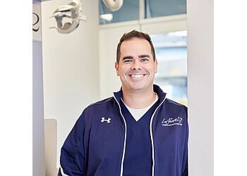 Photo of MATTHEW LOPRESTI, TREATMENTS OFFERED:Restorative, Cosmetic, General and Preventative Dentistry, Emergency Dental Treatment, Invisalign, Veneers, Root Canal, Single-Visit Porcelain Crowns, Mouth Guards, Onlays, Implants, Bridges, Dentures, Teeth Whitening, Orthodontics &amp; Tooth-Colored Filling in STAMFORD