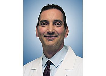 Photo of MICHAEL COOK, CONDITIONS TREATED:Bunion Treatment, Tailor&#x27;s Bunion Treatment, Hammertoe Correction, Joint Replacement, Forefoot Reconstruction, Trauma, Ingrown Nail Treatment, Foot Surgery, Sports Medicine, Pediatrics, Biomechanics/Orthotics &amp; Soft Tissue Procedures in MIAMI