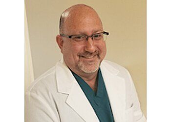 Photo of MICHAEL KAYE, CONDITIONS TREATED:Corns, Calluses, Hammer Toes, Foot Pain, Flat Feet, Heel Pain/Plantar Fasciitis, Ingrown Toenails, Diabetic Foot Care/Diabetic Ulcers, Sports Injuries, Nail Fungus, Blisters, Warts, Bunion Removal, Heel Spurs, Gout, Skin or Nail Conditions, Arthritis &amp; Joint Pain in MOBILE