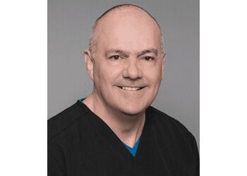 Photo of MICHAEL MCGUINESS, CONDITIONS TREATED:Acne, Moles, Psoriasis, Rash, Rosacea, Skin Cancer, Warts &amp; Skin ExamTREATMENTS OFFERED:Brown Spots, Dermal Fillers, Dermaplanning, Facial Wrinkles, Hydrafacial, Kybella, Microdermabrasion, Microneedling, Ultherapy, Wrinkles, Xtrac Psoriasis Treatment, Miradry, Hyperhidrosis, Laser Hair Removal, Scar Treatment, Skincare, Stretch Marks, Tattoo Removal &amp; Vein Treatment in PLANO