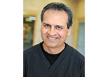 Photo of NABEEL M. RAHMAN, CONDITIONS TREATED: Sleep Apnea, TMJ, Oral Cancer and Drug-Free Headache
TREATMENTS OFFERED: General and Preventive Dentistry, Routine Dental Cleanings, Exams, Sealants, Fluoride Treatments, Custom Athletic Mouthguards, Tooth-Colored Fillings, Fixed Bridges, Full Dentures, Removable Partial Dentures &amp; Extractions in CHESAPEAKE